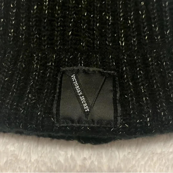 Victoria’s Secret Black Pom Pom Knit Hat - Picture 2 of 3